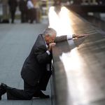 Robert Peraza, who lost his son Robert David Peraza, pauses at his son's name at the 9/11 Memorial today
